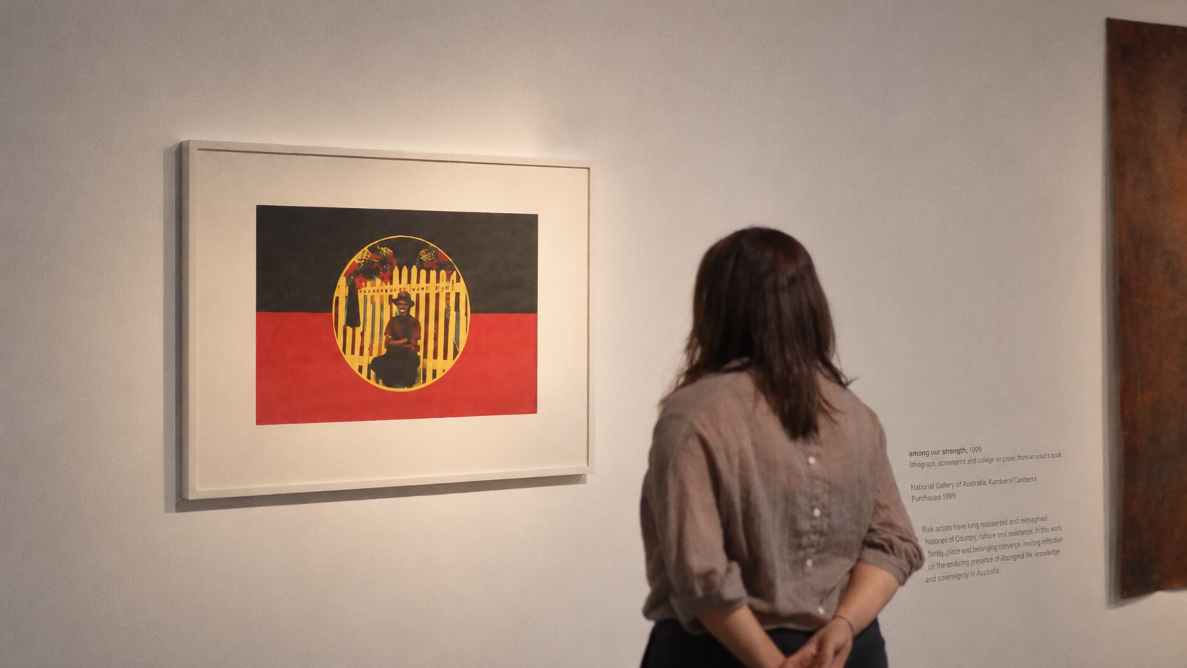 Woman looking at an artwork 